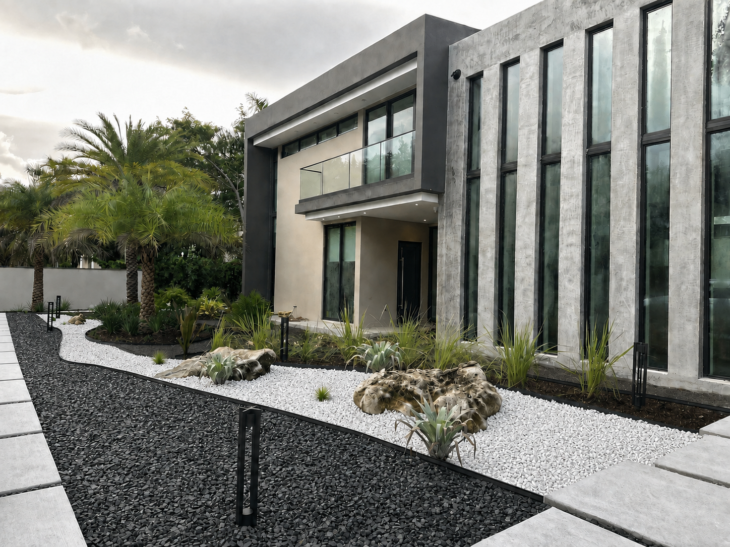 Contemporary black-and-white stone landscape at a modern residence